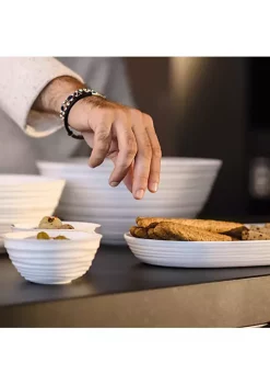 Guzzini serving tray 5000cc, taupe. Made by recycling twelve 100% disposable water bottles. 8 Guzzini serving tray 5000cc, taupe. Made by recycling twelve 100% disposable water bottles. -Guzzin Shop Belk 187