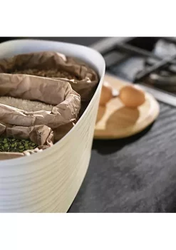 Guzzini bread bin with bamboo breadboard, taupe. Made by recycling twenty-seven 100% disposable water bottles. -Guzzin Shop Belk 27